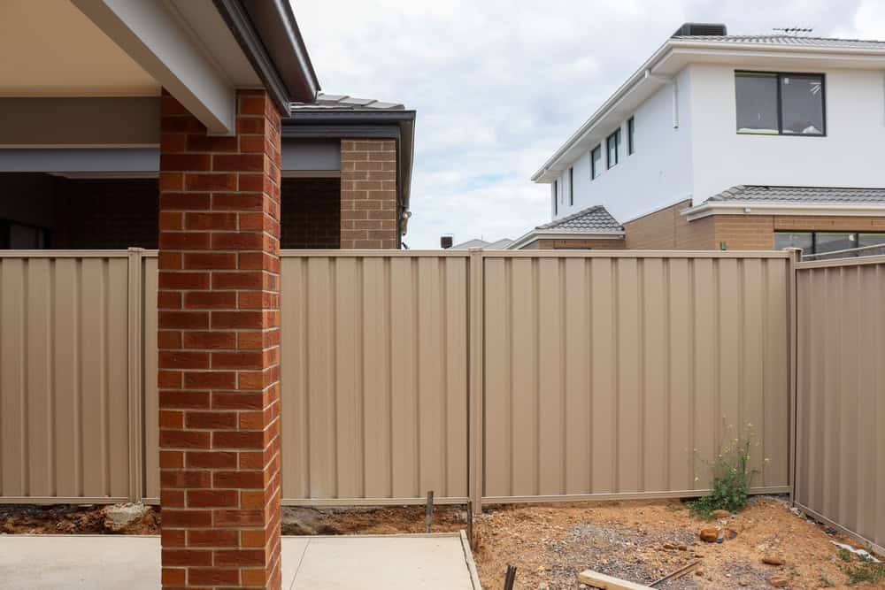 What Are My Rights When My Neighbor Owns the Wall I Want to Paint Guildford?
